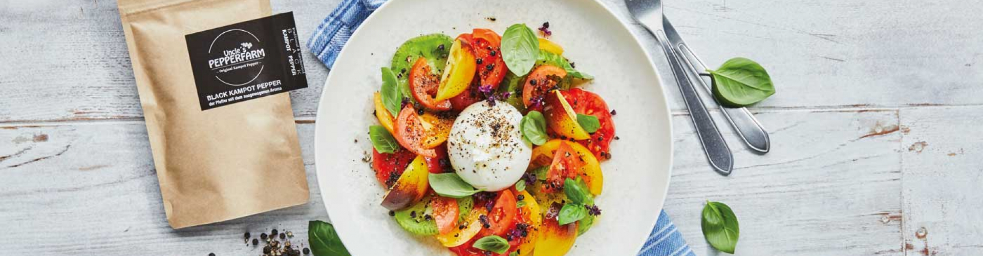 Tomatensalat mit Burrata und Kampot Pfeffer